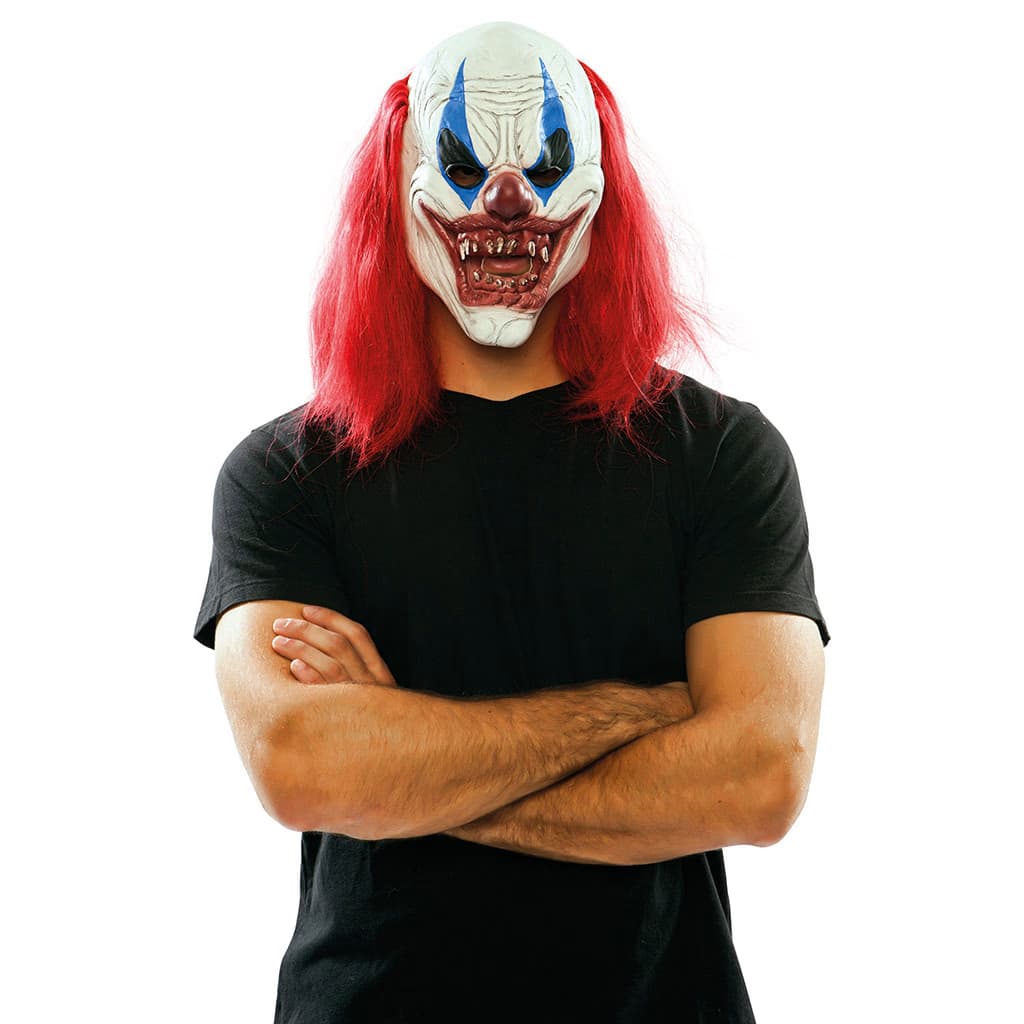 Hombre llevando la Máscara Payaso Diabólico Fyasa de látex con melena roja de Dulcealmacen