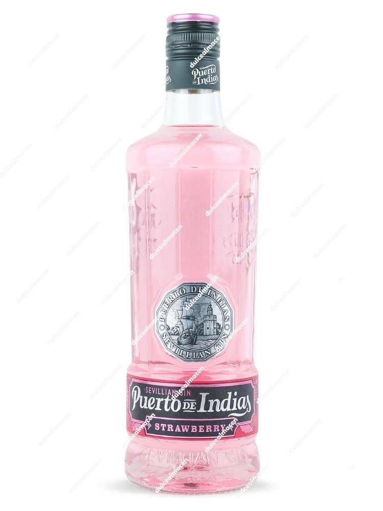 Botella de Gin Puerto de Indias Fresa 0.70L con líquido rosado y etiqueta blanca - Dulcealmacen