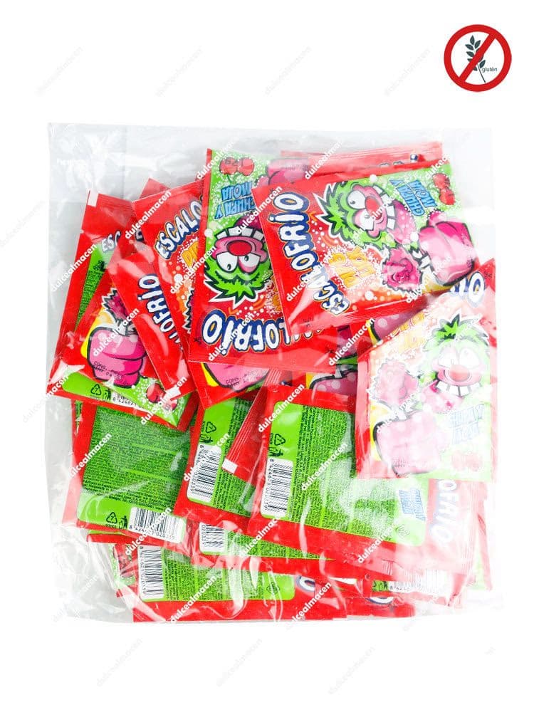 Paquete transparente con 25 sobres individuales de Escalofrio con Piruleta de Juan López mostrando el logo Sin Gluten y el diseño colorido de los sobres - Dulcealmacen