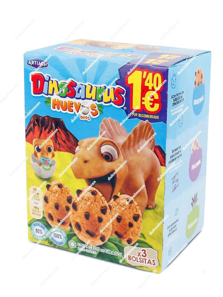 Caja de galletas vertical de color azul de la marca Artiach Dinosaurus Huevos, mostrando la ilustración de un tiranosaurio bebé saliendo de un huevo, un volcán y galletas con forma de huevo flotando, con un precio recomendado de 1,40 euros en la esquina superior derecha - Dulcealmacen