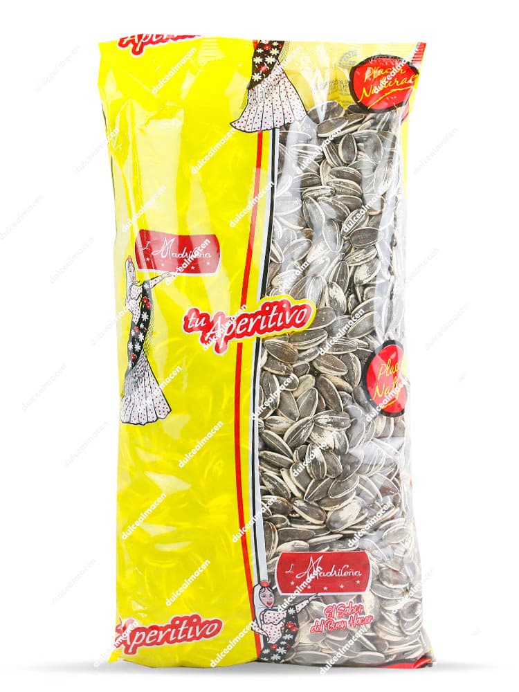 Bolsa de 1 kg de Pipas Crudas La Madrileña, con diseño amarillo y transparente que muestra las semillas de girasol naturales, incluyendo el logotipo tradicional de la marca - Dulcealmacen