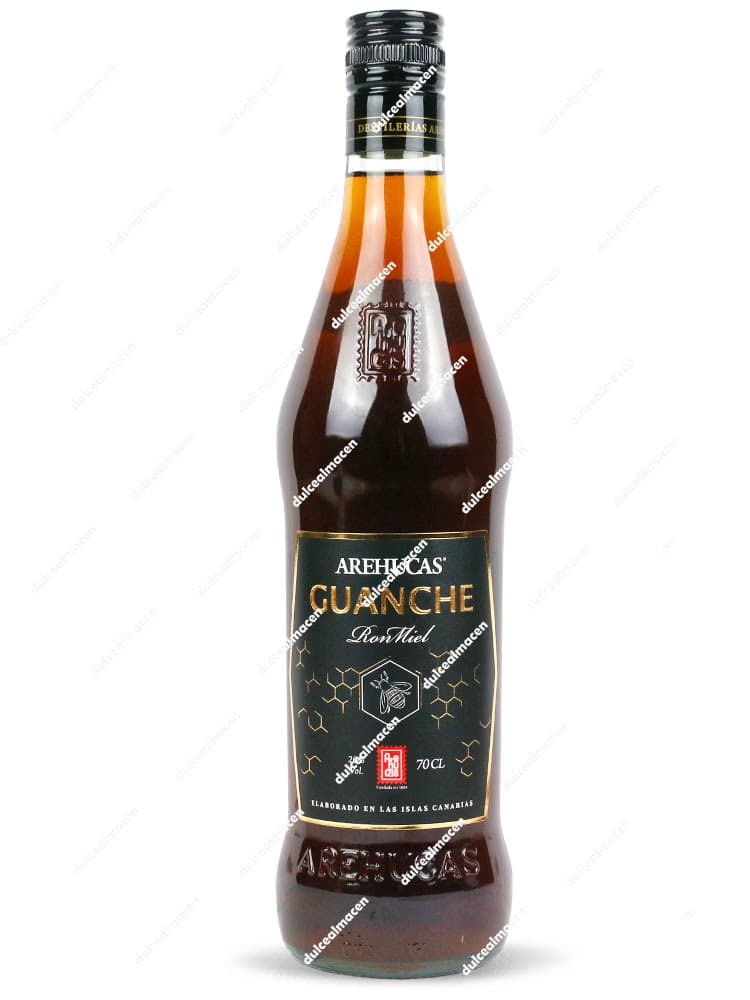 Botella de Ron Arehucas Miel Guanche 0,70 L con etiqueta negra y dorada - Dulcealmacen