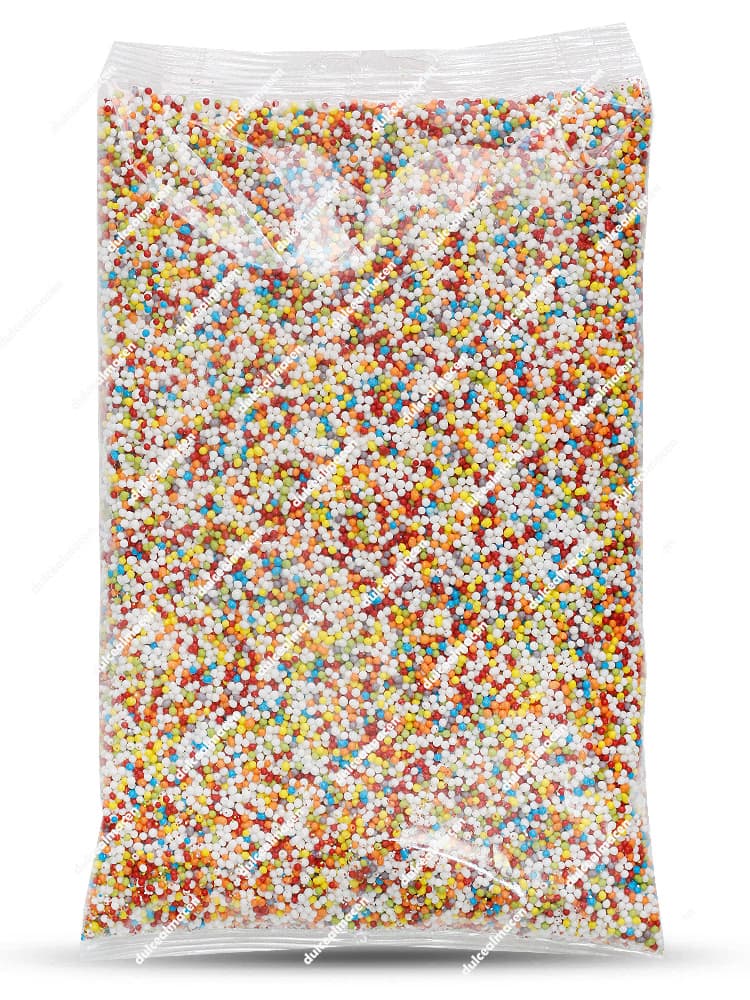 Bolsa transparente rellena de granillo de azúcar multicolor con bolitas redondas rojas, amarillas, azules, verdes y blancas para decoración de repostería y tartas de chuches - Dulcealmacen