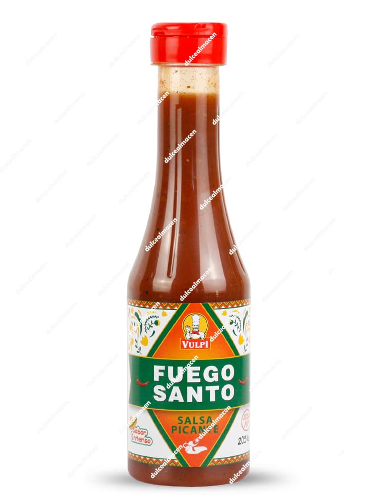 Botella plástica transparente boca abajo de la salsa extra picante Vulpi Fuego Santo de 205 gramos, con tapón dosificador negro y una etiqueta frontal de color naranja con el dibujo de una calavera rodeada de llamas - Dulcealmacen